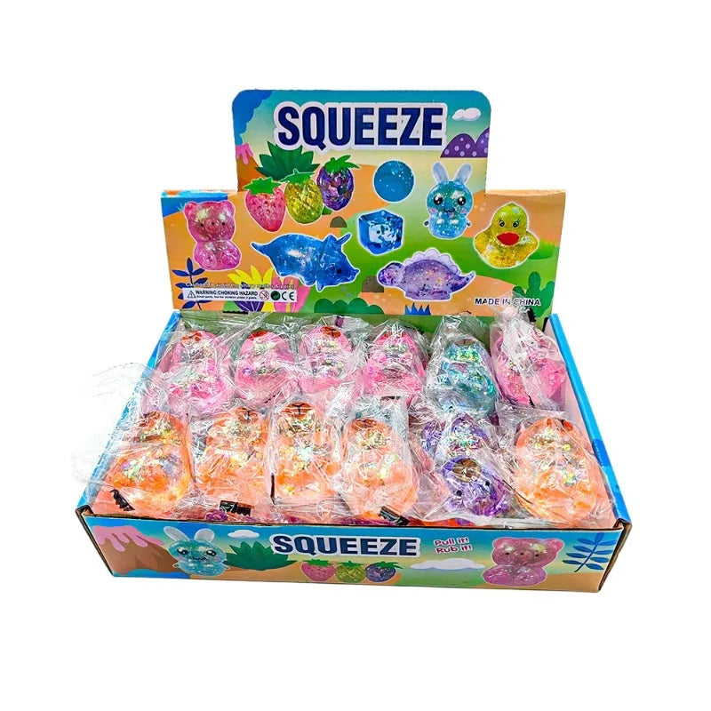 Squishy capybara gummy pailleté posé sur une surface claire