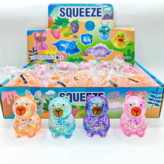 Squishy capybara gummy pailleté anti-stress, les quatre coloris rose, bleu, violet et orange