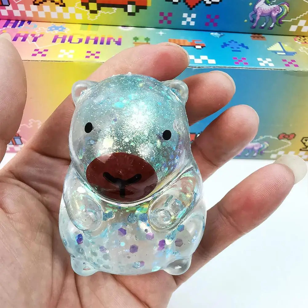 Squishy capybara anti-stress pressé entre les doigts
